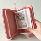 White inner pages inside a Holdiva 1-pocket pink card binder