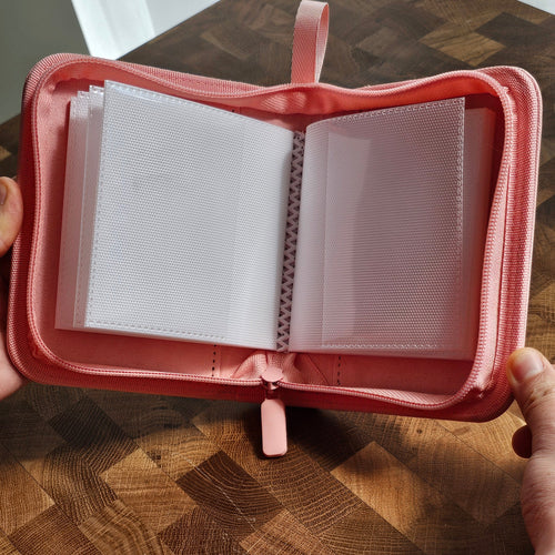 1-pocket Holdiva pink card binder with white inner pages and logo-free cover